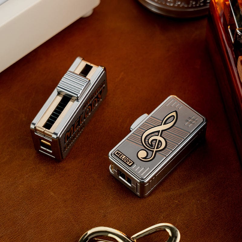 DJG Fidget Slider MELODY Titanium+Brass (ships in 80 days)