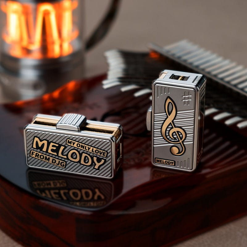 DJG Fidget Slider MELODY Titanium+Brass (ships in 80 days)